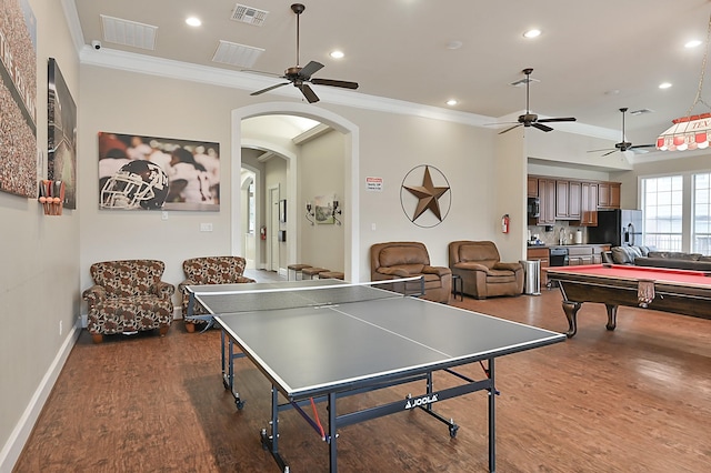 game room featuring hardwood / wood-style floors, ceiling fan, crown molding, and pool table