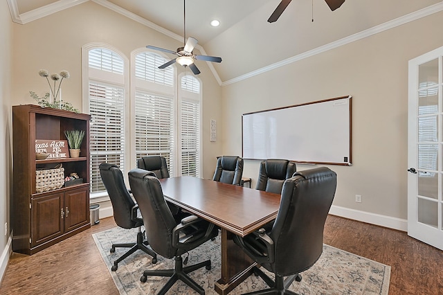 home office featuring crown molding, ceiling fan, vaulted ceiling, and hardwood / wood-style flooring