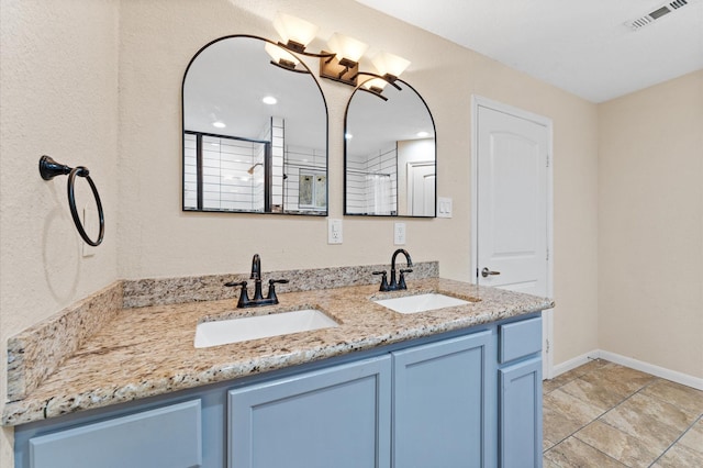 bathroom featuring vanity and walk in shower