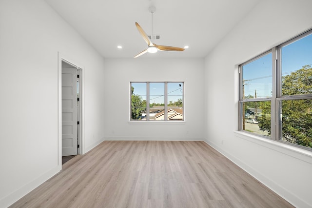 empty room featuring light hardwood / wood-style flooring and plenty of natural light