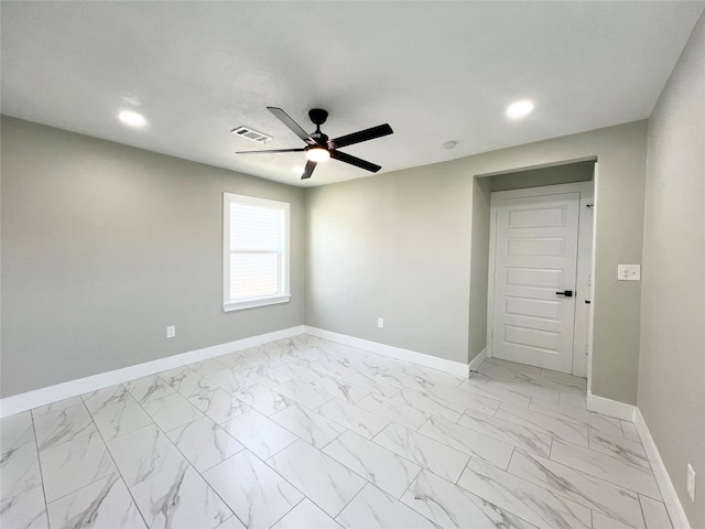 unfurnished room with ceiling fan