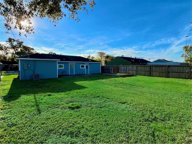 view of yard with central AC