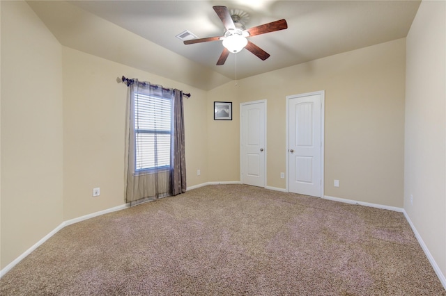 carpeted empty room featuring ceiling fan