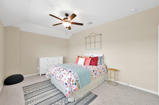 carpeted bedroom featuring lofted ceiling and ceiling fan