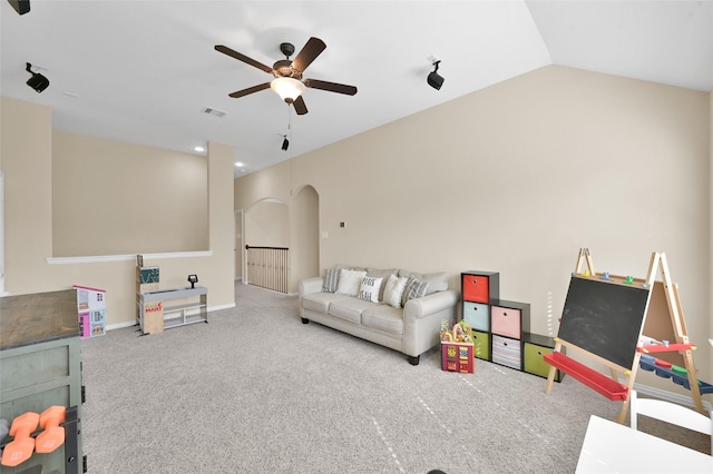 game room with vaulted ceiling and ceiling fan