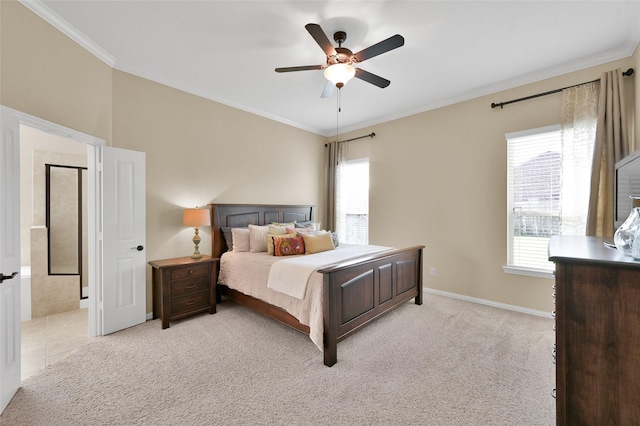 carpeted bedroom with multiple windows, ornamental molding, ensuite bathroom, and ceiling fan