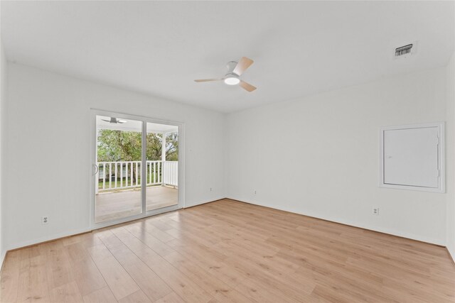 empty room with light hardwood / wood-style floors and ceiling fan