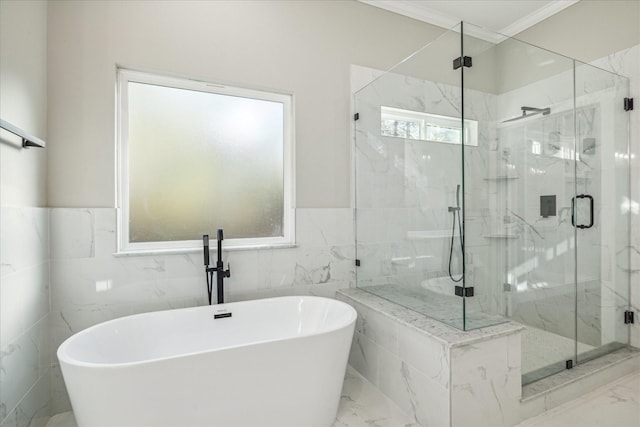 full bath featuring a marble finish shower, marble finish floor, ornamental molding, and a freestanding tub