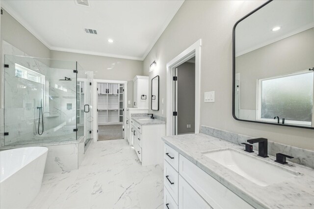 bathroom with vanity, separate shower and tub, and crown molding