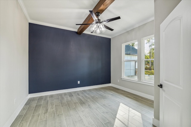 spare room featuring beam ceiling, light hardwood / wood-style flooring, ceiling fan, and crown molding