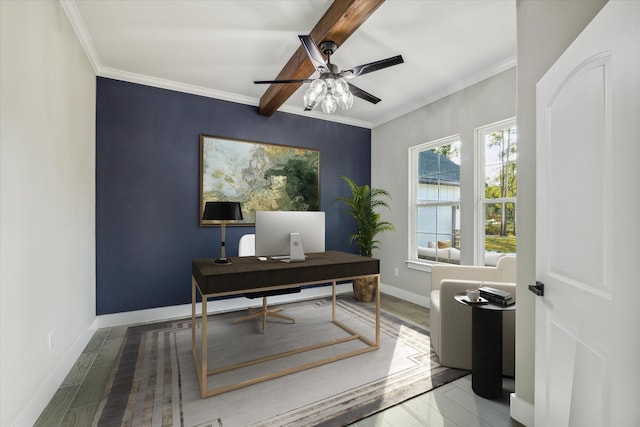 office area featuring ceiling fan, hardwood / wood-style floors, beamed ceiling, and ornamental molding