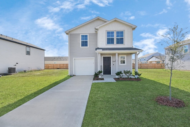 view of front of home featuring central AC, a garage, and a front lawn