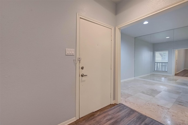 entrance foyer featuring hardwood / wood-style floors