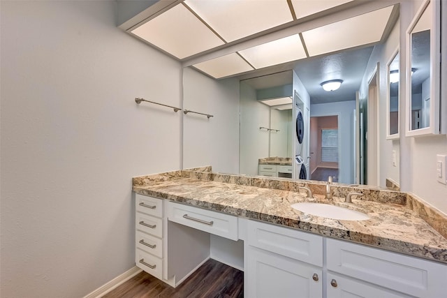 bathroom featuring vanity and wood-type flooring