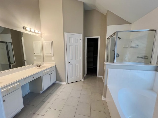 bathroom featuring tile patterned floors, vanity, plus walk in shower, and high vaulted ceiling