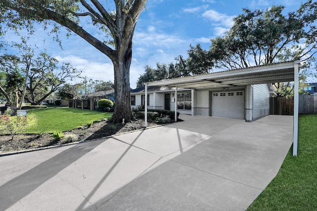 single story home with a garage and a front lawn