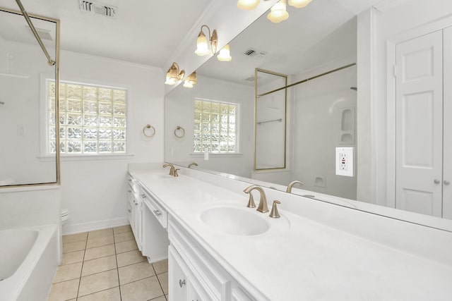 bathroom featuring vanity, toilet, and tile patterned flooring