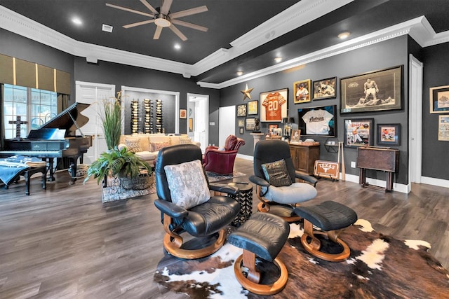 interior space with hardwood / wood-style flooring, ceiling fan, and crown molding