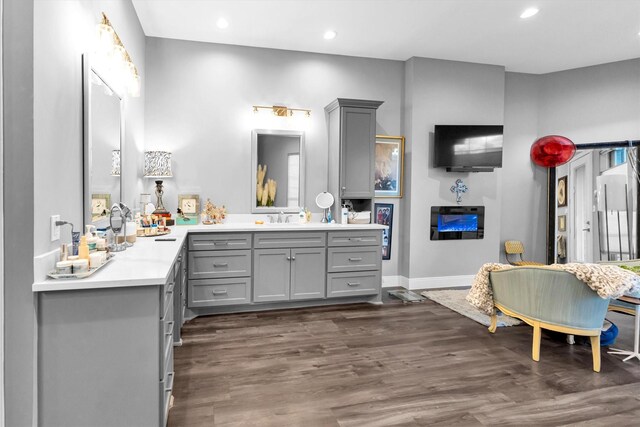 bathroom featuring vanity and wood-type flooring