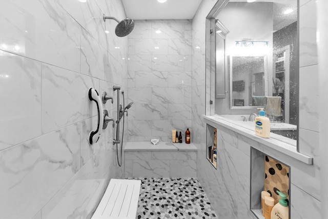 bathroom featuring tiled shower