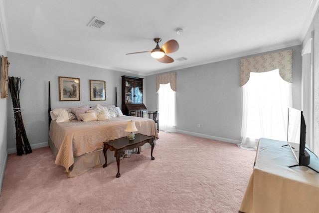 bedroom featuring crown molding, ceiling fan, and light carpet