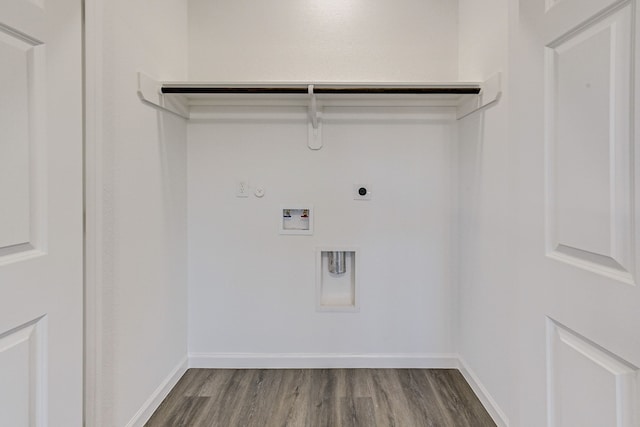 laundry room with hookup for an electric dryer, hookup for a washing machine, hookup for a gas dryer, and dark wood-type flooring