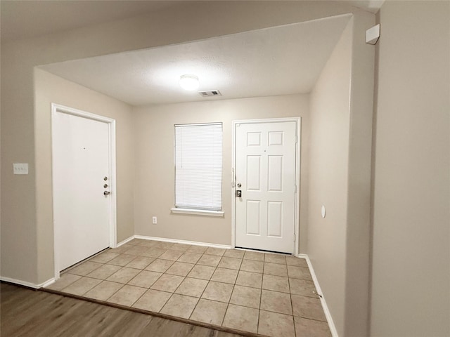 foyer featuring light hardwood / wood-style floors