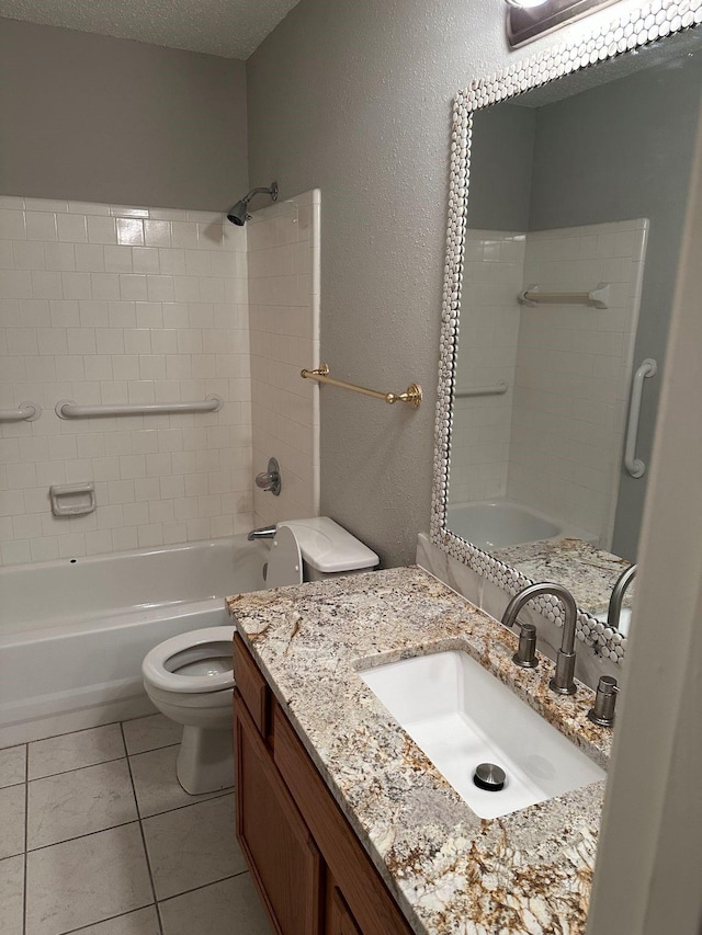 full bathroom featuring toilet, tile patterned flooring, vanity, and bathtub / shower combination