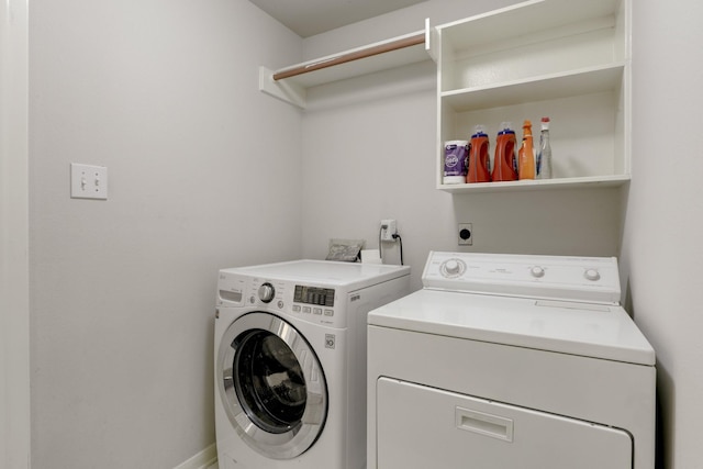 washroom featuring separate washer and dryer