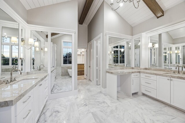 bathroom with a bathtub, vanity, wooden ceiling, high vaulted ceiling, and beamed ceiling