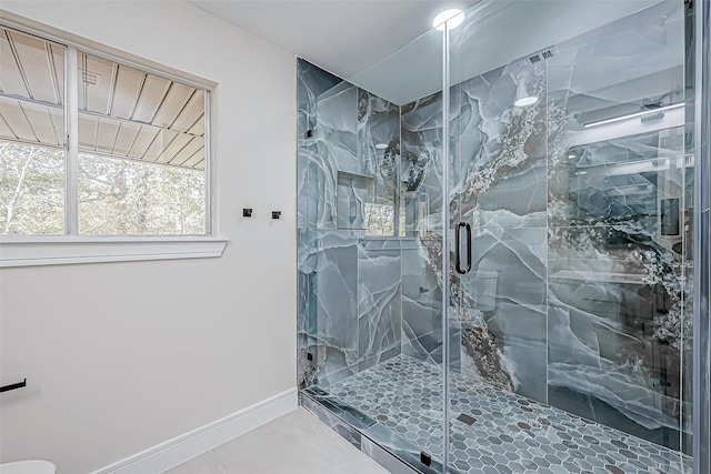 bathroom featuring an enclosed shower