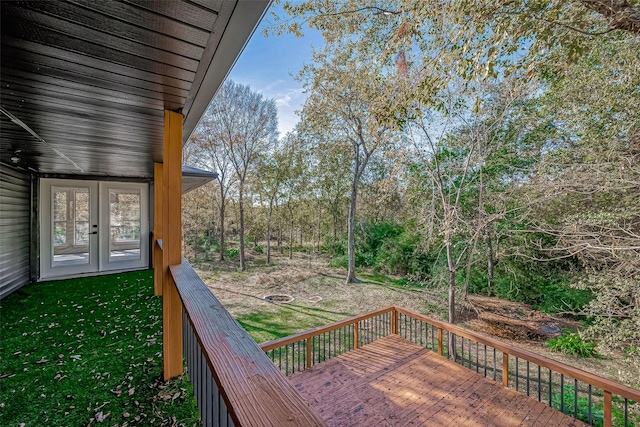 wooden deck featuring french doors