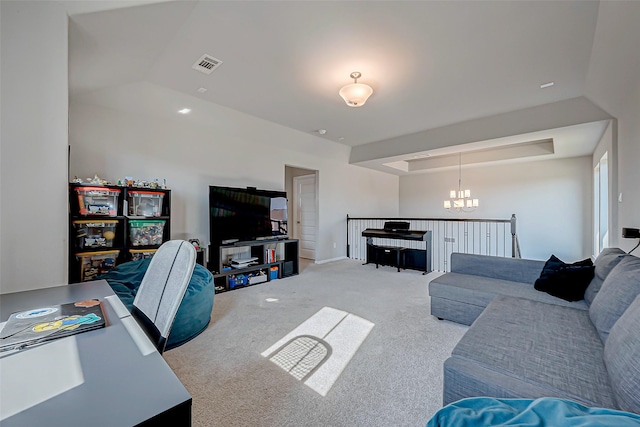 living room with light carpet and a notable chandelier