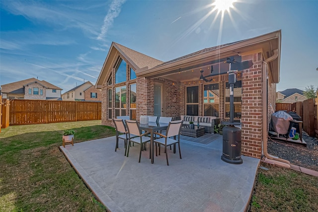 view of patio featuring outdoor lounge area, ceiling fan, and a grill