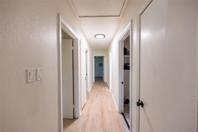 hall featuring light hardwood / wood-style flooring