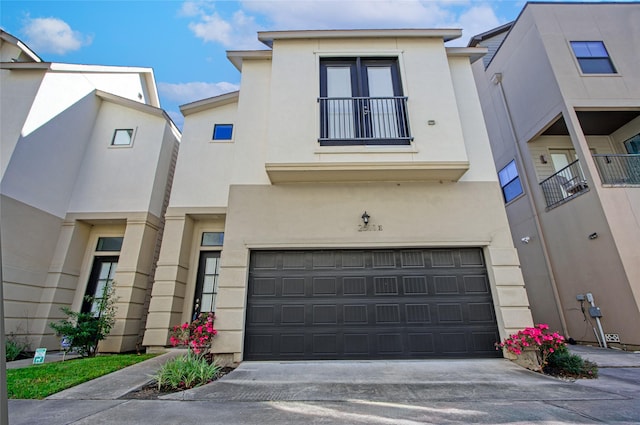 multi unit property featuring a garage