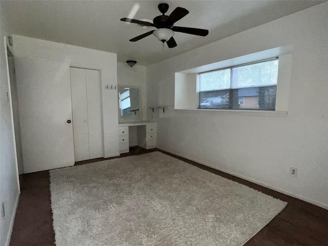 unfurnished bedroom featuring a closet and ceiling fan