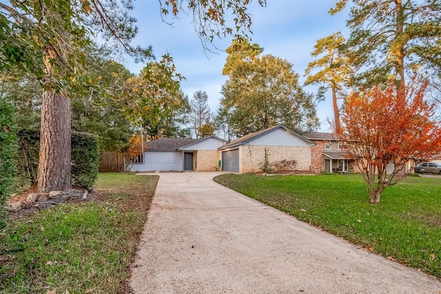 ranch-style house featuring a front yard