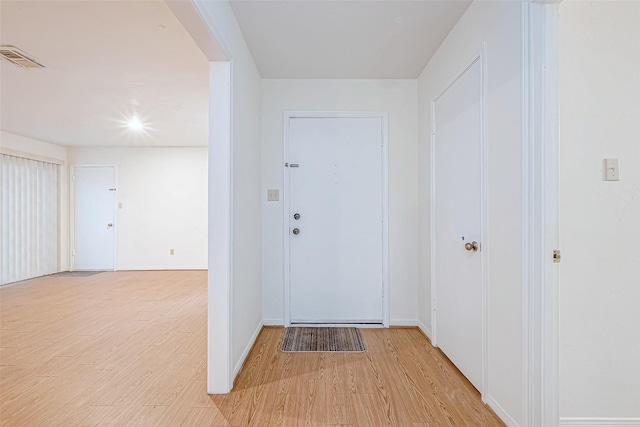 entrance foyer with light wood-type flooring