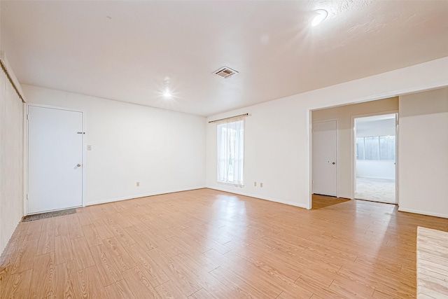 empty room featuring light wood-type flooring