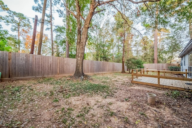 view of yard with a deck