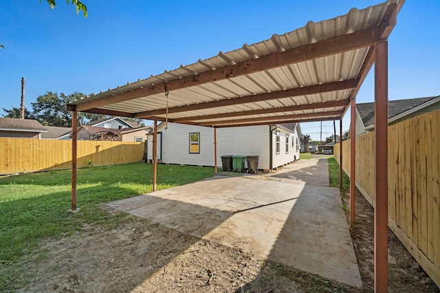 view of patio / terrace featuring a carport