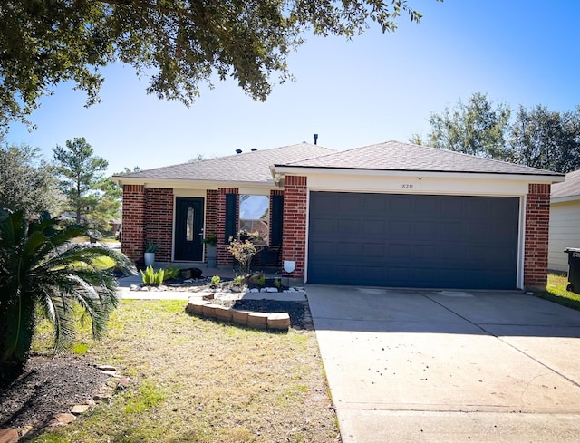 ranch-style home featuring a garage