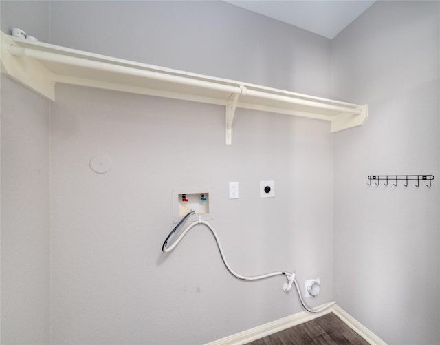 clothes washing area featuring hardwood / wood-style flooring, electric dryer hookup, gas dryer hookup, and hookup for a washing machine