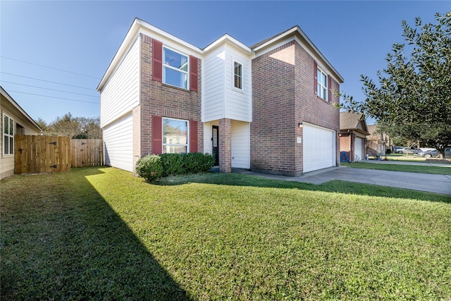 view of front of home featuring a front yard and a garage