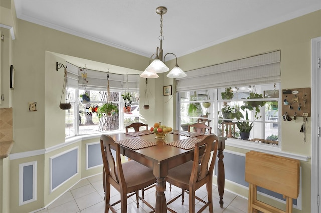 tiled dining room with ornamental molding