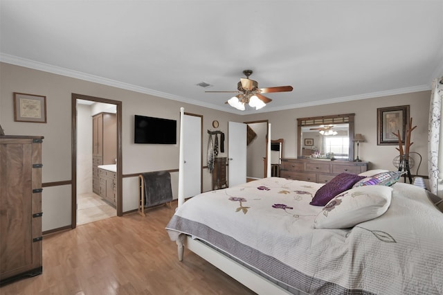 bedroom featuring ceiling fan, light wood-type flooring, ensuite bathroom, and ornamental molding