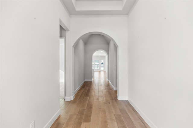 hall with light wood-type flooring