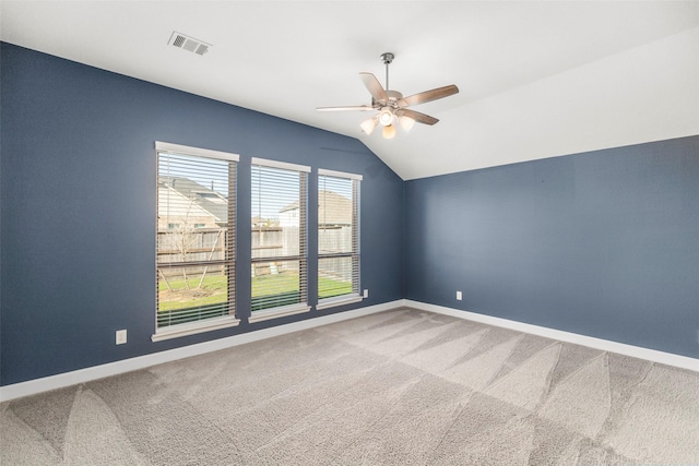 unfurnished room with carpet, ceiling fan, and lofted ceiling