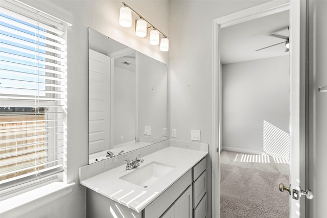 bathroom featuring vanity and ceiling fan